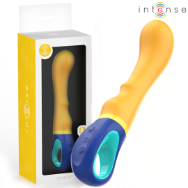 Intense Shaggy G-Spot Vibrator in yellow with ergonomic handle, shown next to its branded packaging
